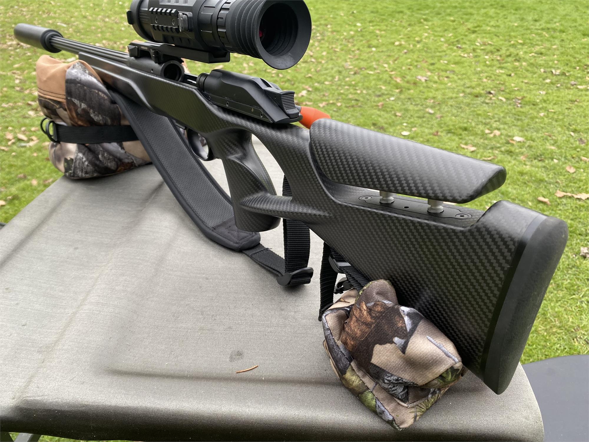 Camo two-piece rifle rest set by A1 Decoy Ltd with adjustable supports and camouflage fabric for stable firearm support.
