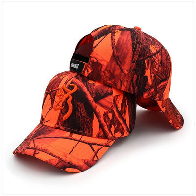 Browning camouflage hunting hat with blaze orange accents, featuring a wide brim and outdoor camouflage pattern.