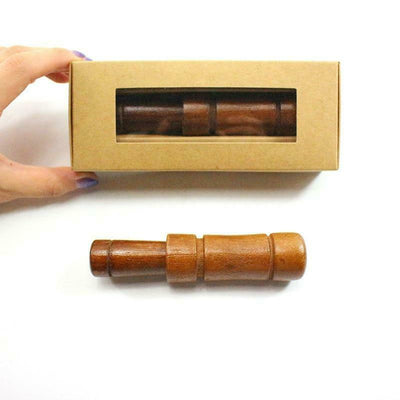 Manual oak duck call by ALIEXPRESS, showing a detailed wooden duck call for hunting and bird sound imitation.