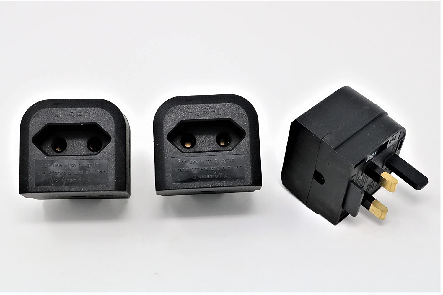 European to UK plug adaptor converter by AliExpress, showing the compact black plug with UK socket compatibility.