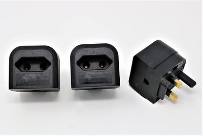 European to UK plug adaptor converter by AliExpress, showing the compact black plug with UK socket compatibility.