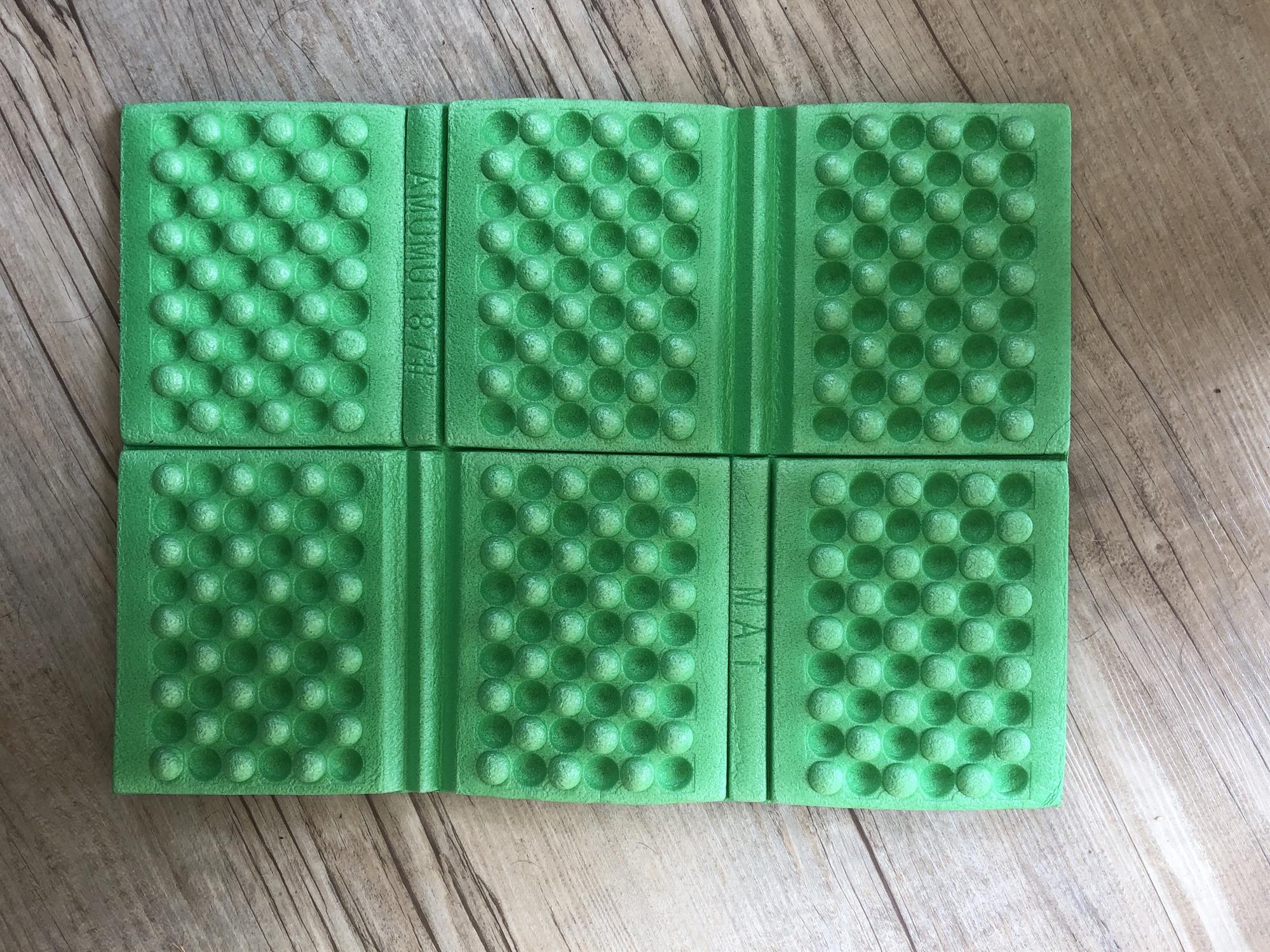 Green padded waterproof folding cushion for high seats or hunting from AliExpress, featuring a soft, durable surface and compact design.