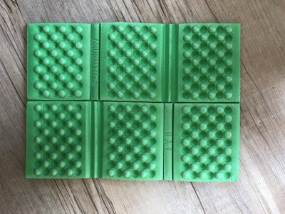 Green padded waterproof folding cushion for high seats or hunting from AliExpress, featuring a soft, durable surface and compact design.