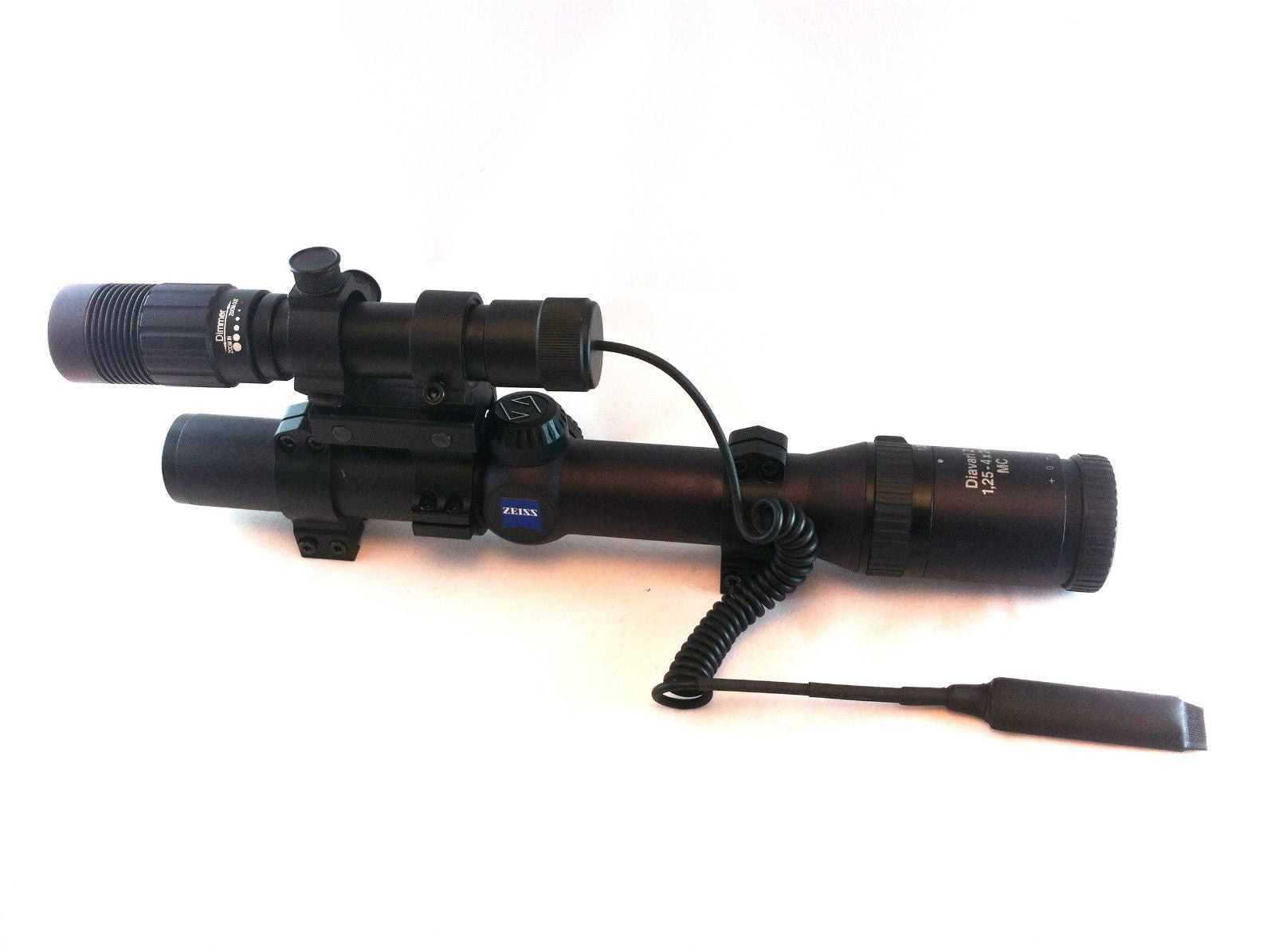Red dot laser sight designator from ALIEXPRESS with a compact black body and adjustable mounting for tactical shooting.