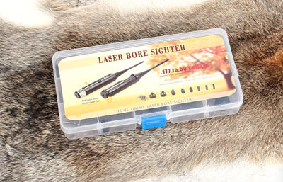 Red and green laser bore sighter for .17 to .50 caliber rifles and 12G/20G shotguns, aiding firearm sight alignment.