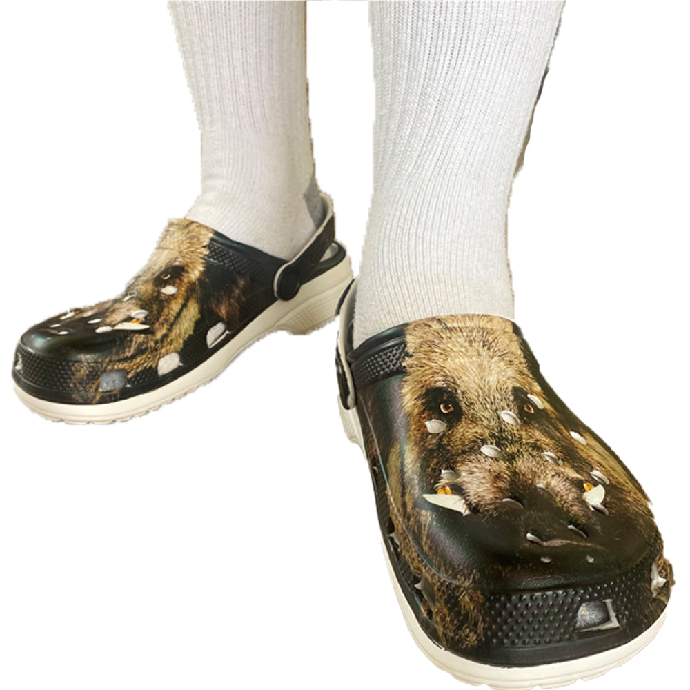 Men's Wildboar Crocs in black, featuring comfortable rubber footwear with a textured design and adjustable heel strap.