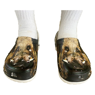 Men's Wildboar Crocs by ALIEXPRESS featuring black rubber material and adjustable heel strap for comfort and casual wear.