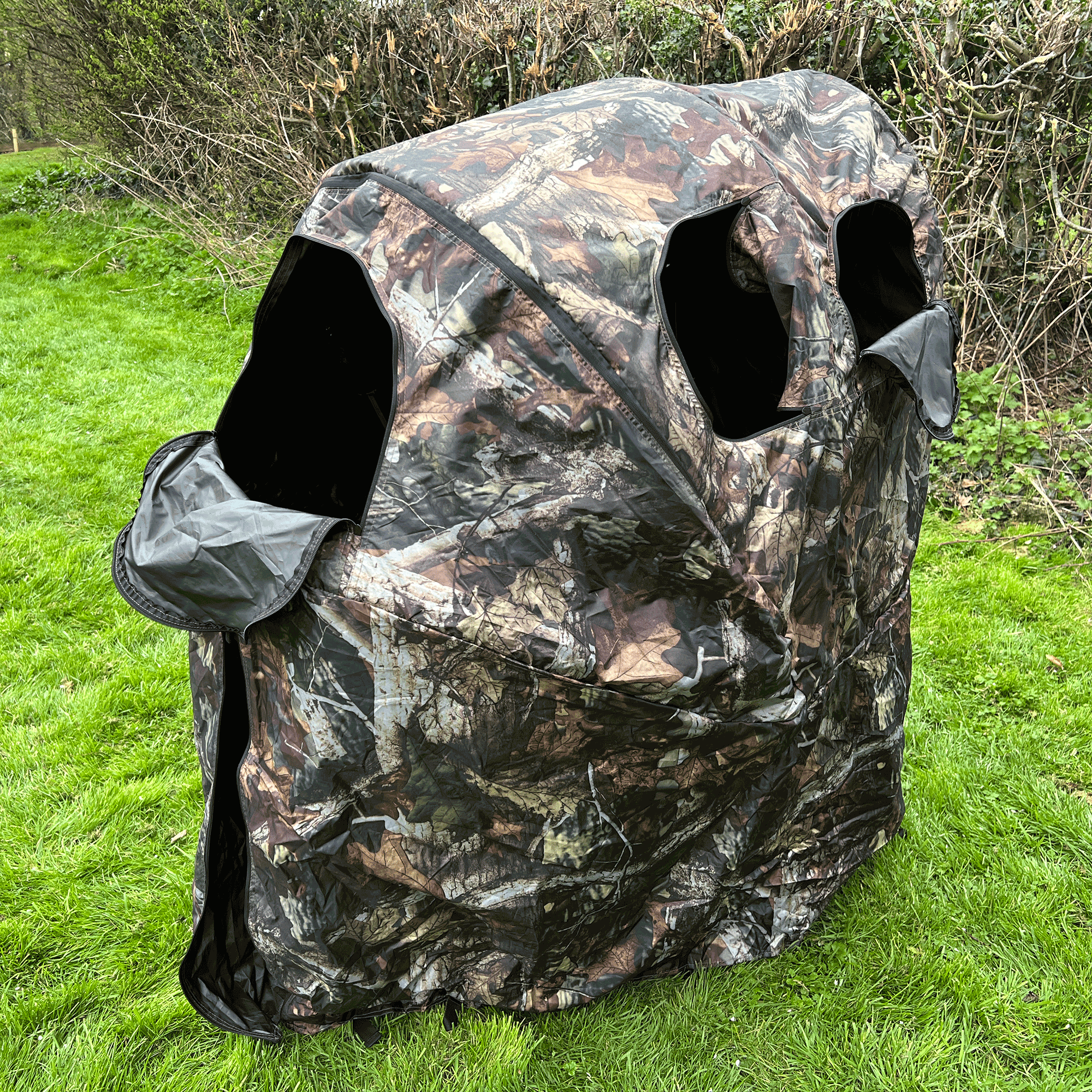 Single man pop-up hide tent by DALE, portable outdoor shelter with camouflage fabric and easy setup for camping or hunting.