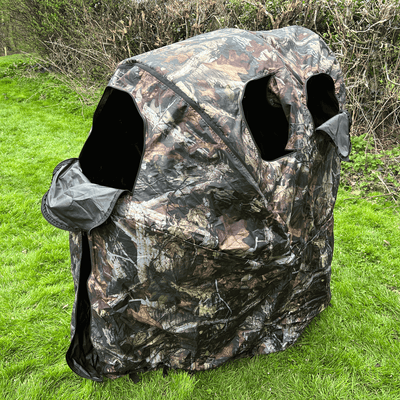 Single man pop-up hide tent by DALE, portable outdoor shelter with camouflage fabric and easy setup for camping or hunting.