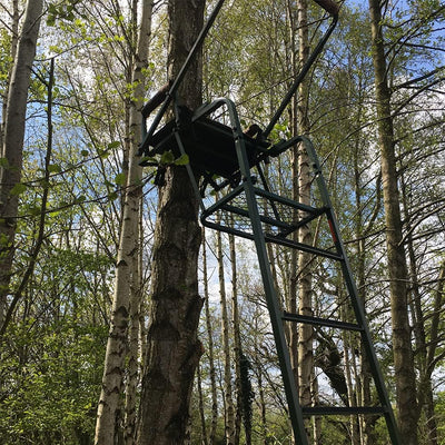 Galvanised adjustable highseat hunting tree stand by DALE, featuring a sturdy frame and secure seat for outdoor hunting.