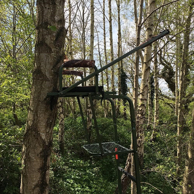 Galvanised adjustable highseat hunting tree stand by DALE, featuring sturdy metal construction for elevated wildlife observation.