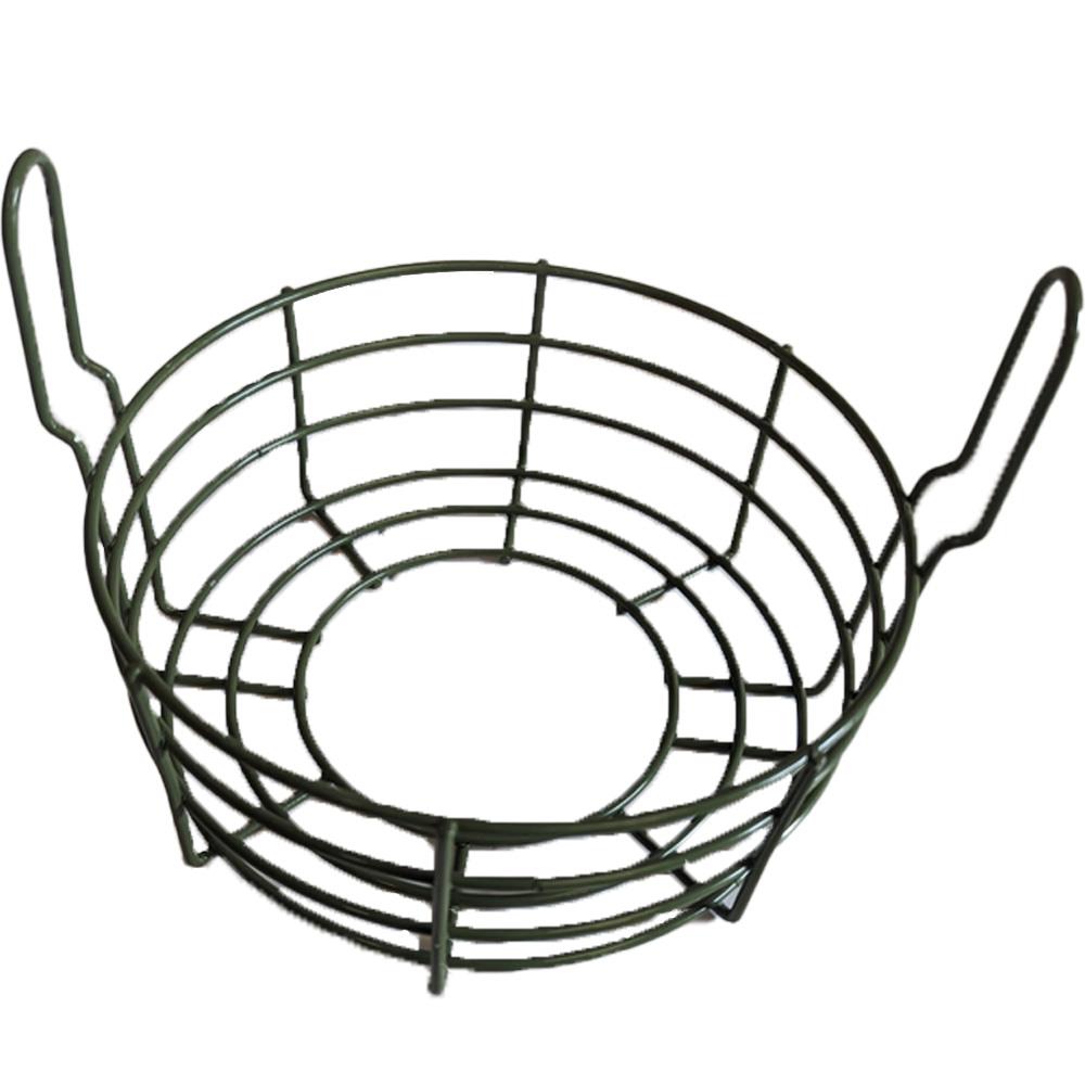 DALE automatic game feeder cage guard to protect the feeder from animals, shown in a natural outdoor setting.