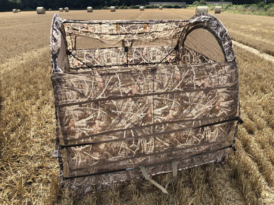 DALE Bale Blind Pop Up Pigeon Hide made of straw for hunting, compact and portable for effective bird concealment.