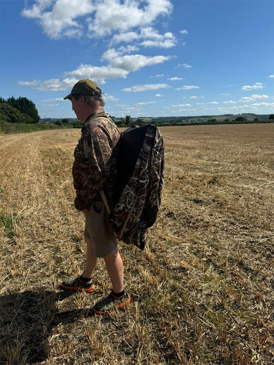 DALE pop-up wildfowl stubble camo lay-down ground blind set up outdoors with camouflage pattern for hunting concealment