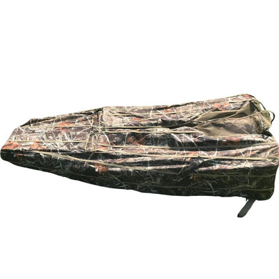 DALE pop-up wildfowl stubble camo lay-down ground blind set up in natural habitat for hunting or birdwatching.