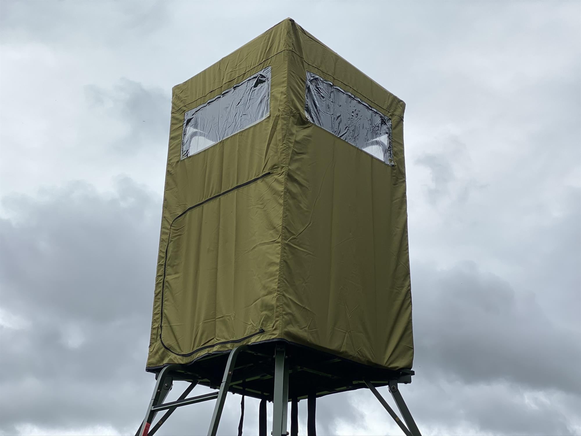 Dale covered double free-standing high seat hunting tower with water-resistant cover, enclosed design, and secure platform for hunting.