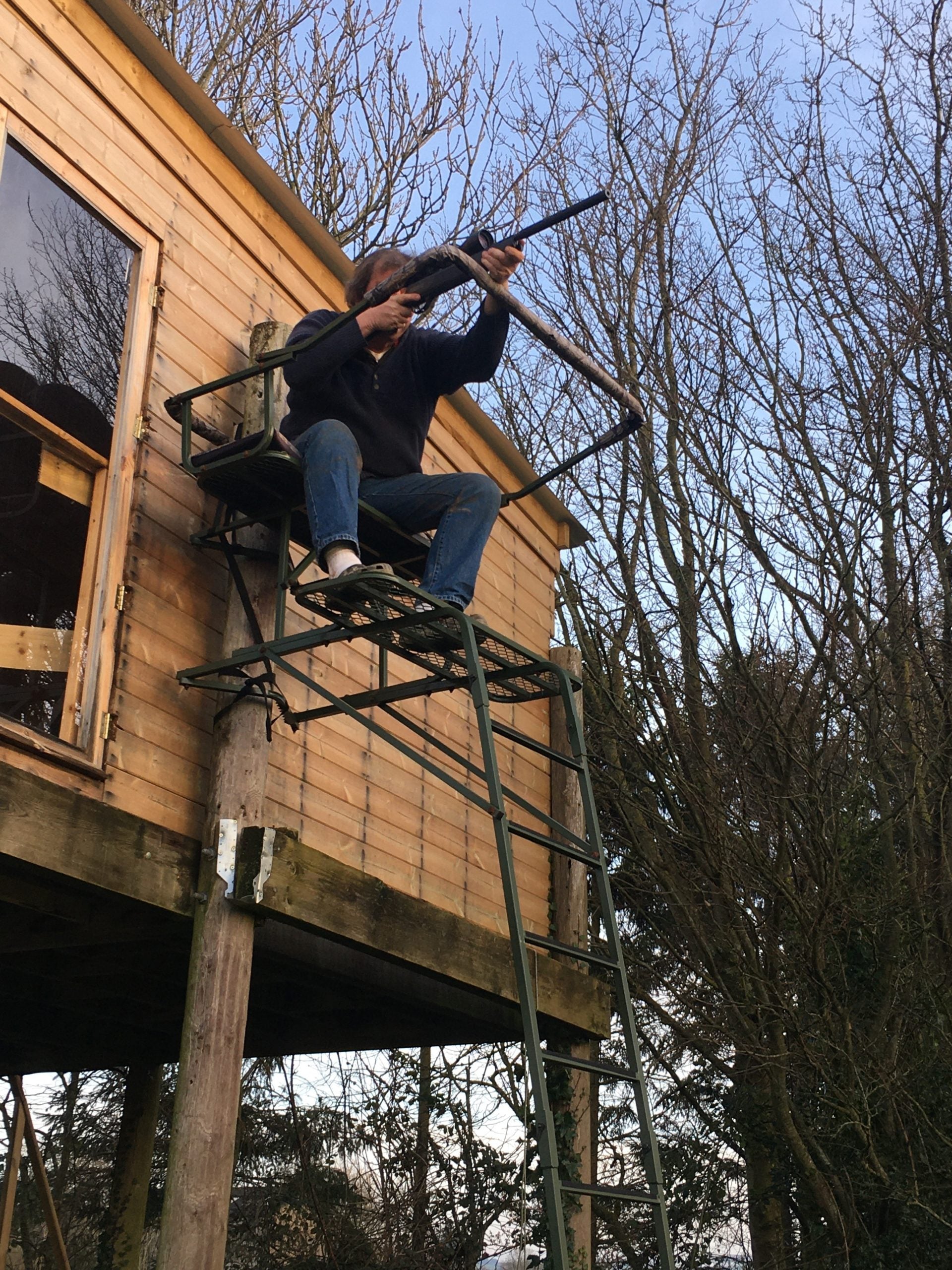 DALE double lean-to high seat ladder stand with padded seating for two hunters, galvanized steel construction.