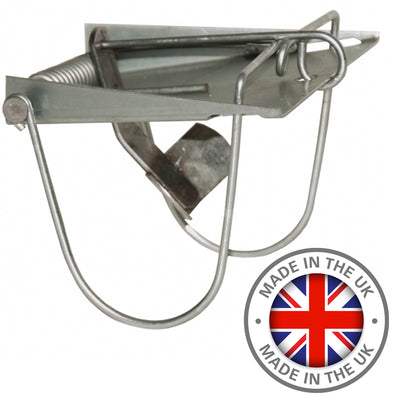 DB Springs Loop Mole and Vermin Fenn Trap shown in black, designed for humane pest control, with metal trap components visible.