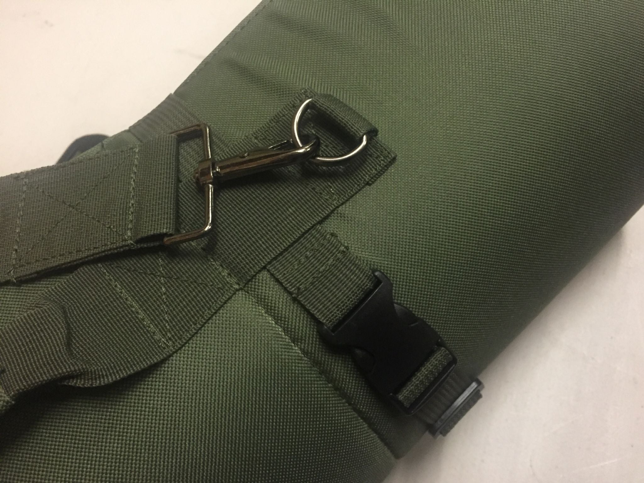 Echo A1 Decoy waterproof shooting mat shown on natural terrain, featuring padded surface and camouflage pattern for outdoor shooting.