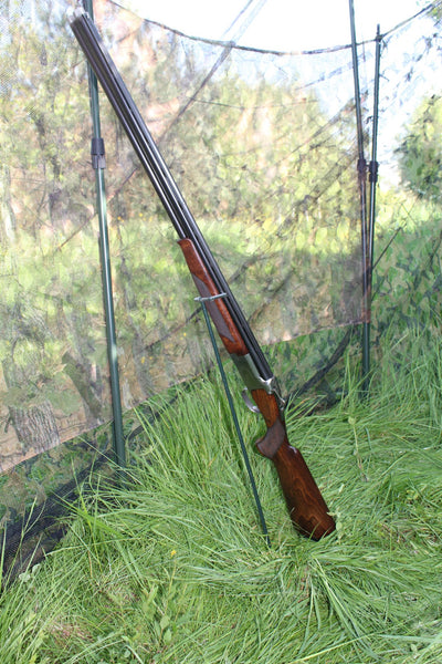 Echo gun stand for hide, durable black gun holder designed for secure storage of hunting rifles and shotguns.