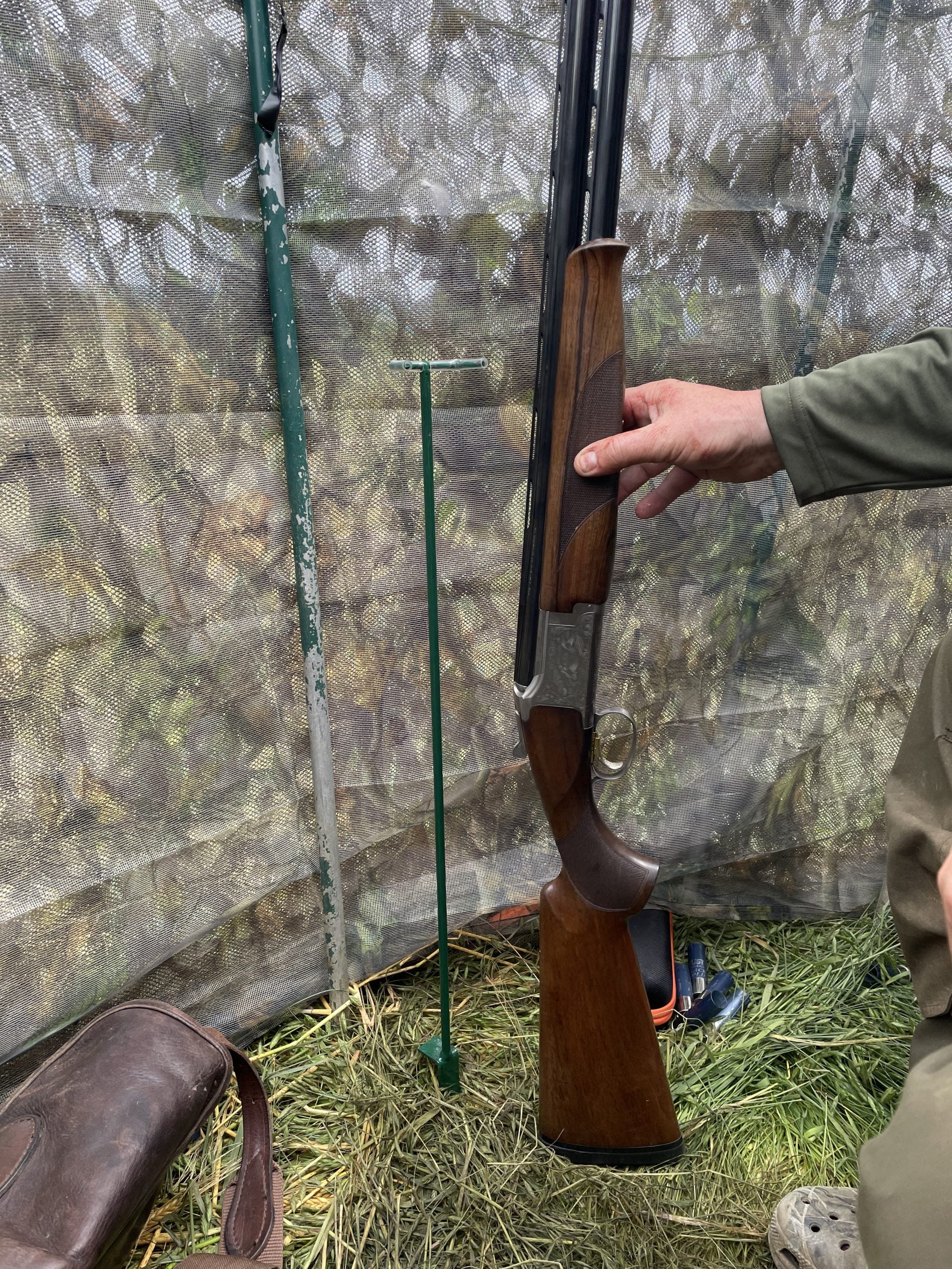 Echo gun stand for hunting hide, sturdy black plastic support for securing rifles or equipment in hunting blinds or hides.
