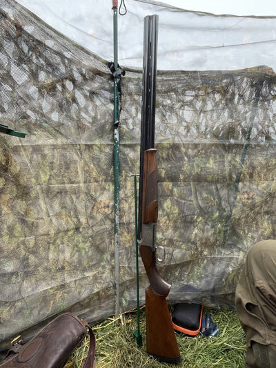 Echo gun stand for hide, designed to securely hold firearms during hunting or storage, with a sturdy and practical design.