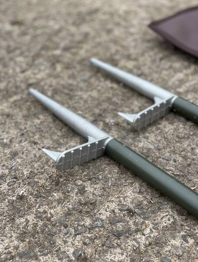 Echo heavy duty hide poles kit with four durable green poles for outdoor game or hunting activities.