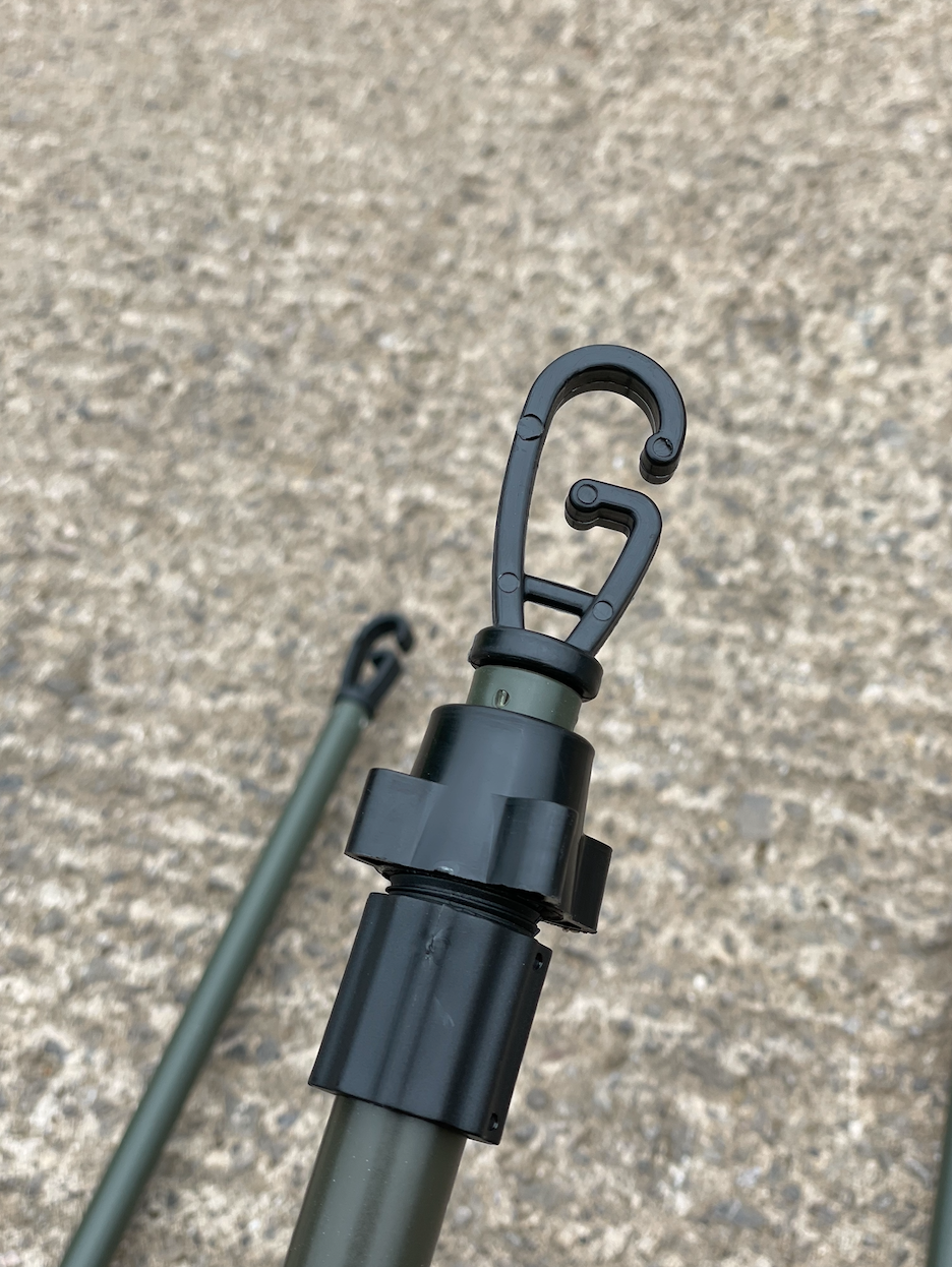 Echo heavy-duty hide poles kit with four durable green hide poles for trapping and hunting setups.
