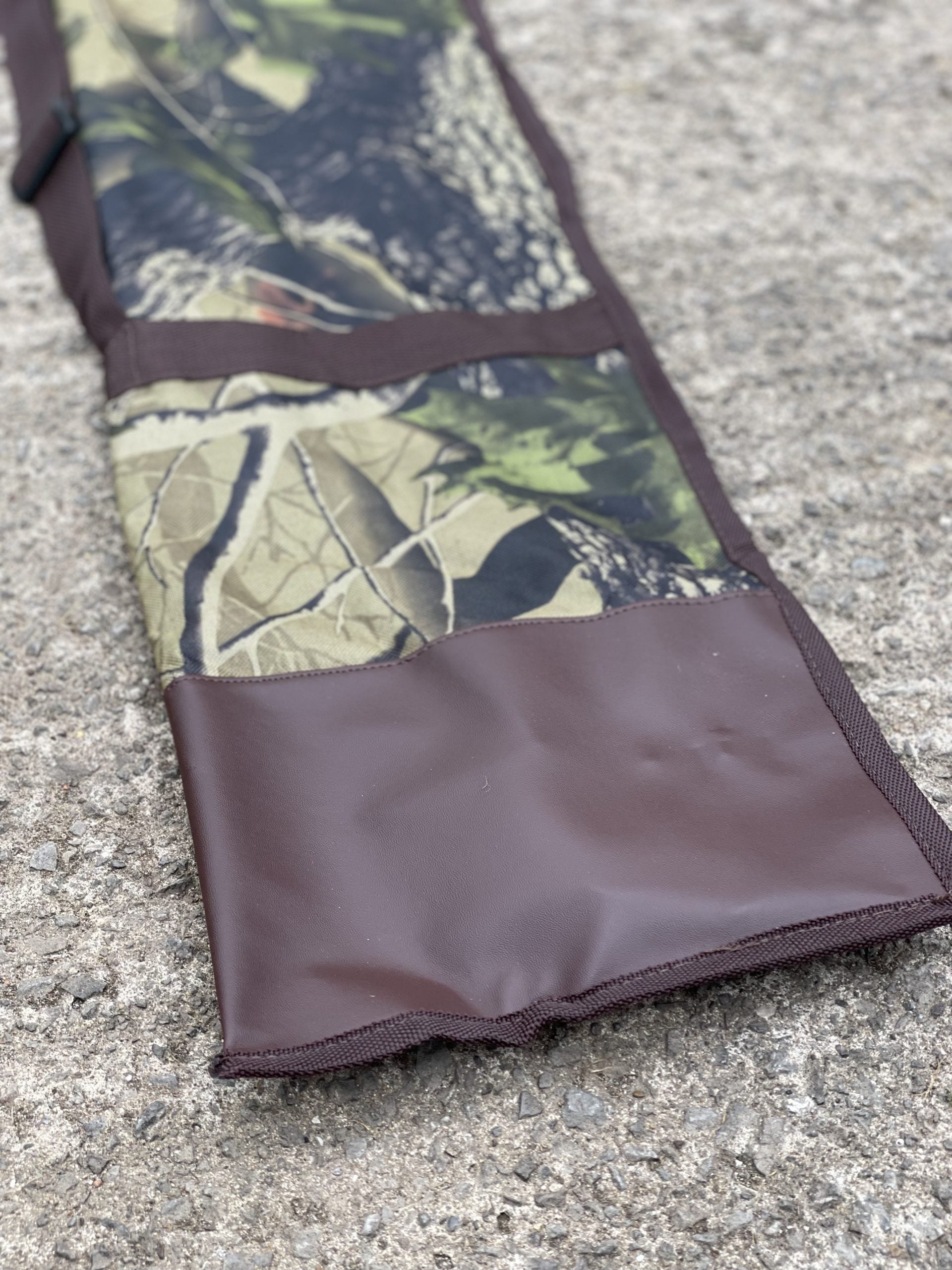 Green 4-pack heavy-duty hide poles kit by ECHO, featuring durable metal poles for outdoor hunting and trapping activities.