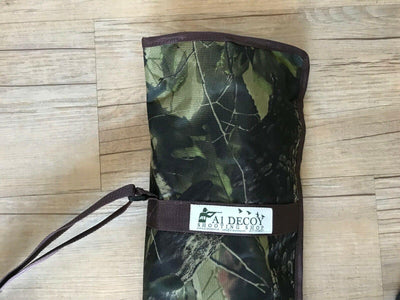Echo 4 single spike hide poles with green or camo canvas bag, ideal for hunting or outdoor concealment.