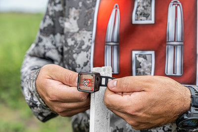 EDGAR Hornady HIT Target Impact Indicator 5-pack showing bright color indicators on targets for shot visibility