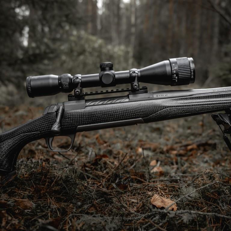 ELITE WULF Fireball 3-9x40 rifle scope with free dovetail mounts, featuring adjustable magnification and clear lens for precision shooting.