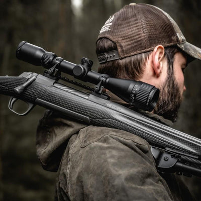 ELITE WULF Fireball 3-9x40 rifle scope with free dovetail mounts, featuring adjustable zoom and clear sighting optics.