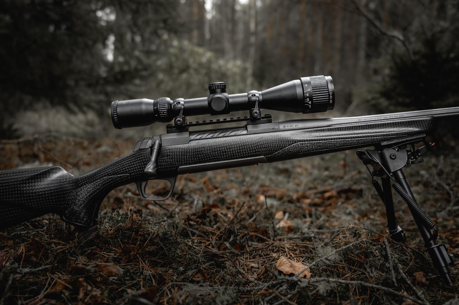 ELITE WULF Fireball 4-12x50 rifle scope with free dovetail mounts, high magnification and durable construction for precision shooting.