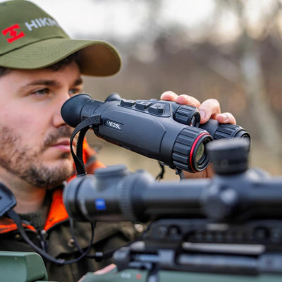 ELITE HIKMICRO HABROK 4K HE25L thermal binoculars with night vision, black and compact design, for outdoor thermal imaging.