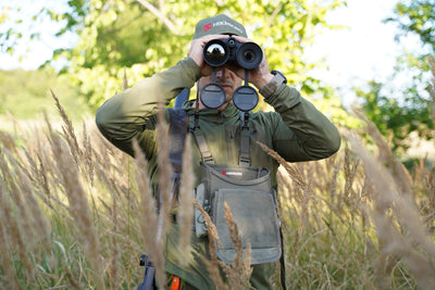 ELITE HIKMICRO Habrok Pro HQ50L multi-spectrum thermal binocular with 50mm lens, 4K camera, laser rangefinder, and harness.