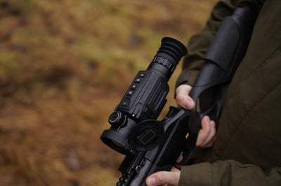 ELITE HIKMIRCO Thunder 2.0 35MM Rifle Scope with Picatinny rail, black finish, adjustable turrets, and lens for precision shooting.