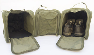 Green Fairfax small muddy boot bag with adjustable strap and compact design, ideal for storing and carrying muddy boots.