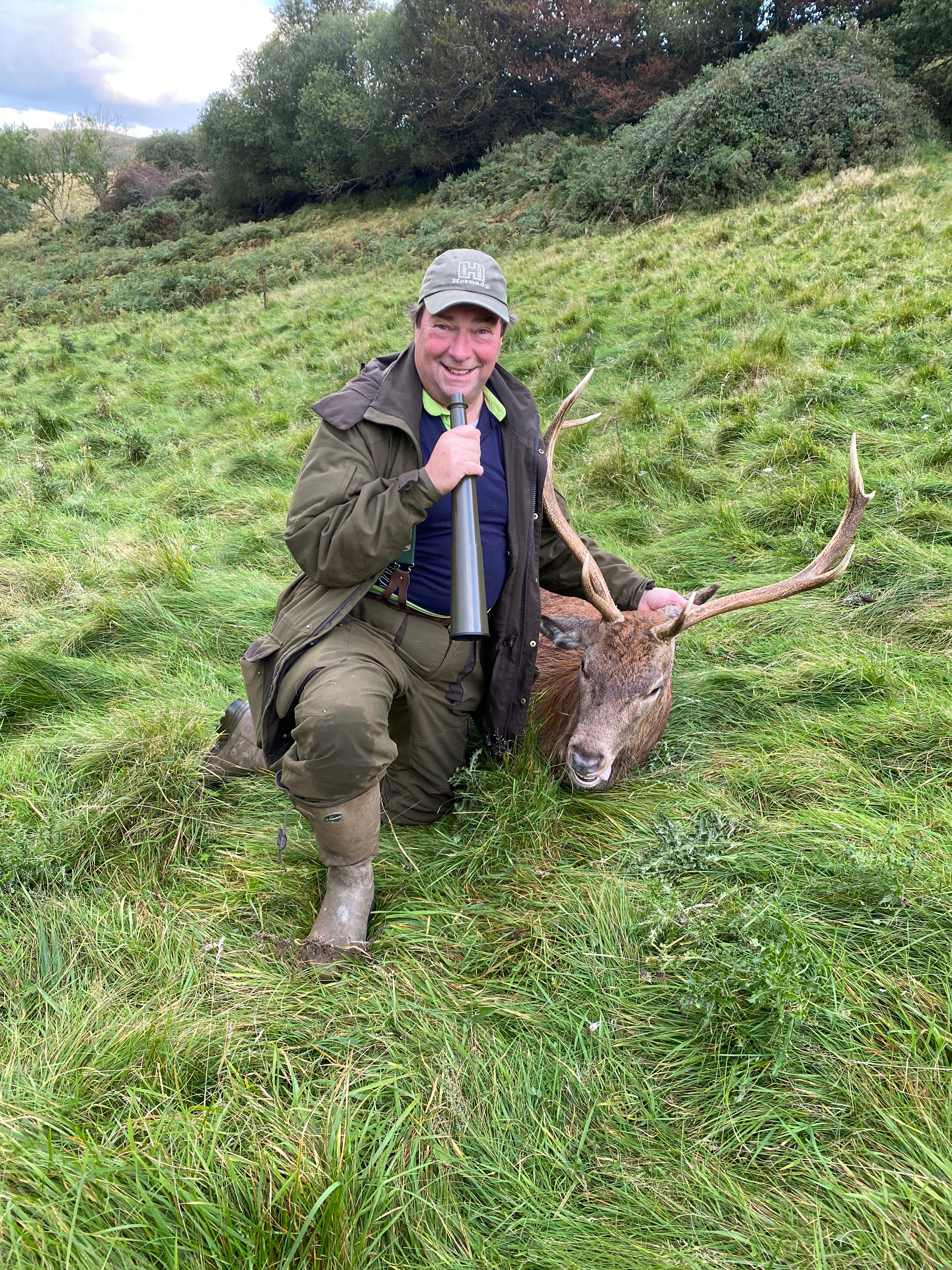 Dark green Stag Red Deer Call by FAULHABER, featuring realistic design and mouthpiece for hunting and wildlife calls.