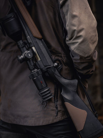 Hawke NocPix NITE D70R 4K Ultra Day and Night Digital Rifle Scope with Laser Rangefinder, mounted on a rifle, detailed optics.