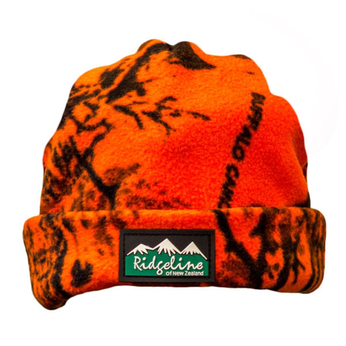 Highland Ridgeline Polar fleece beanie in camo pattern, designed for warmth and outdoor wear.