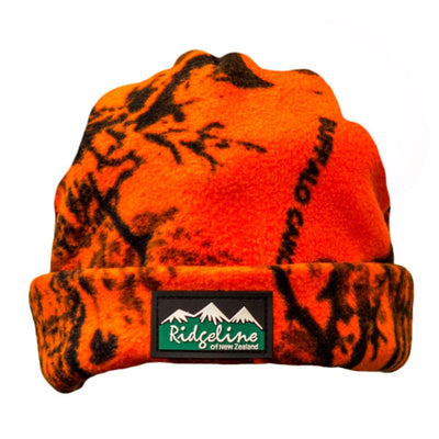Highland Ridgeline Polar fleece beanie in camo pattern, designed for warmth and outdoor wear.