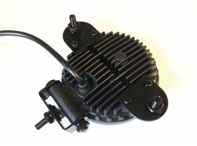 High-powered 15W CREE round work light by Monica, showing a durable black metal housing and bright LED illumination.