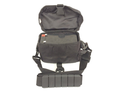 MONICA hunting lamp battery power kit showing batteries and charger for outdoor flashlight or lamp use.
