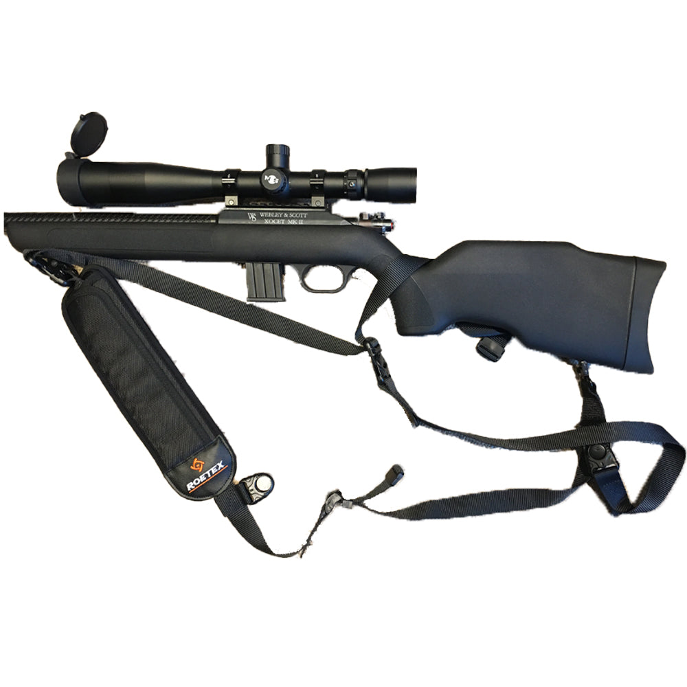 ROETEX Hunter Pro rifle sling attached to a hunting rifle on a right shoulder, adjustable strap and padded design for comfort