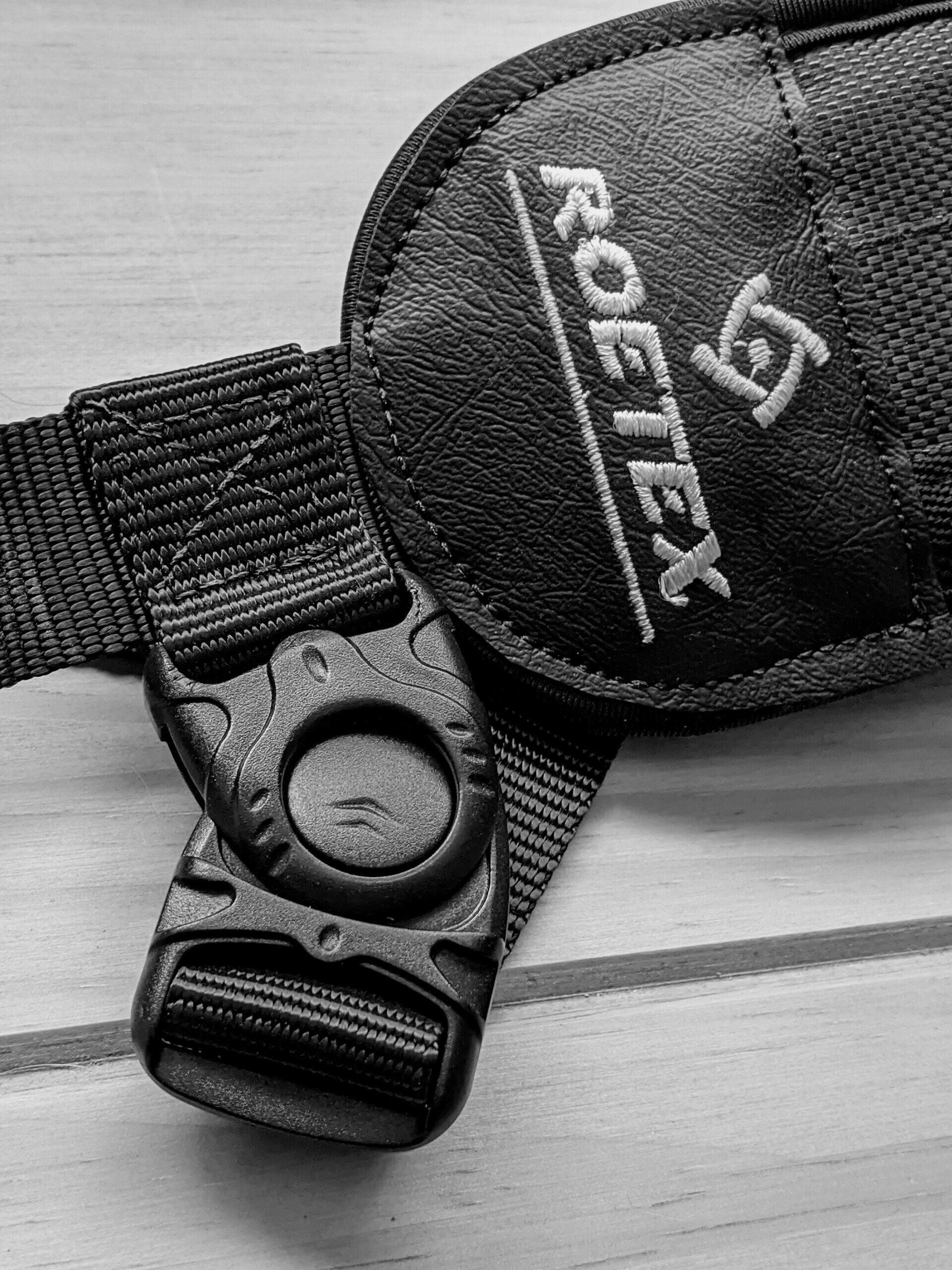 ROETEX Hunter Pro rifle sling attached to a firearm, adjustable strap with padding for comfortable carrying.