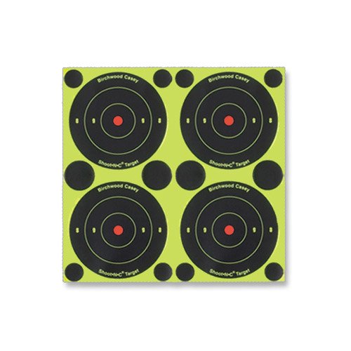 Self-adhesive Birchwood Casey Shoot-N-C targets on a background, designed for accurate shooting practice.
