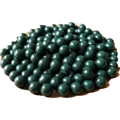 Barnett Black Widow slingshot by Rothery with 100 eco-friendly green mud balls for outdoor target practice.