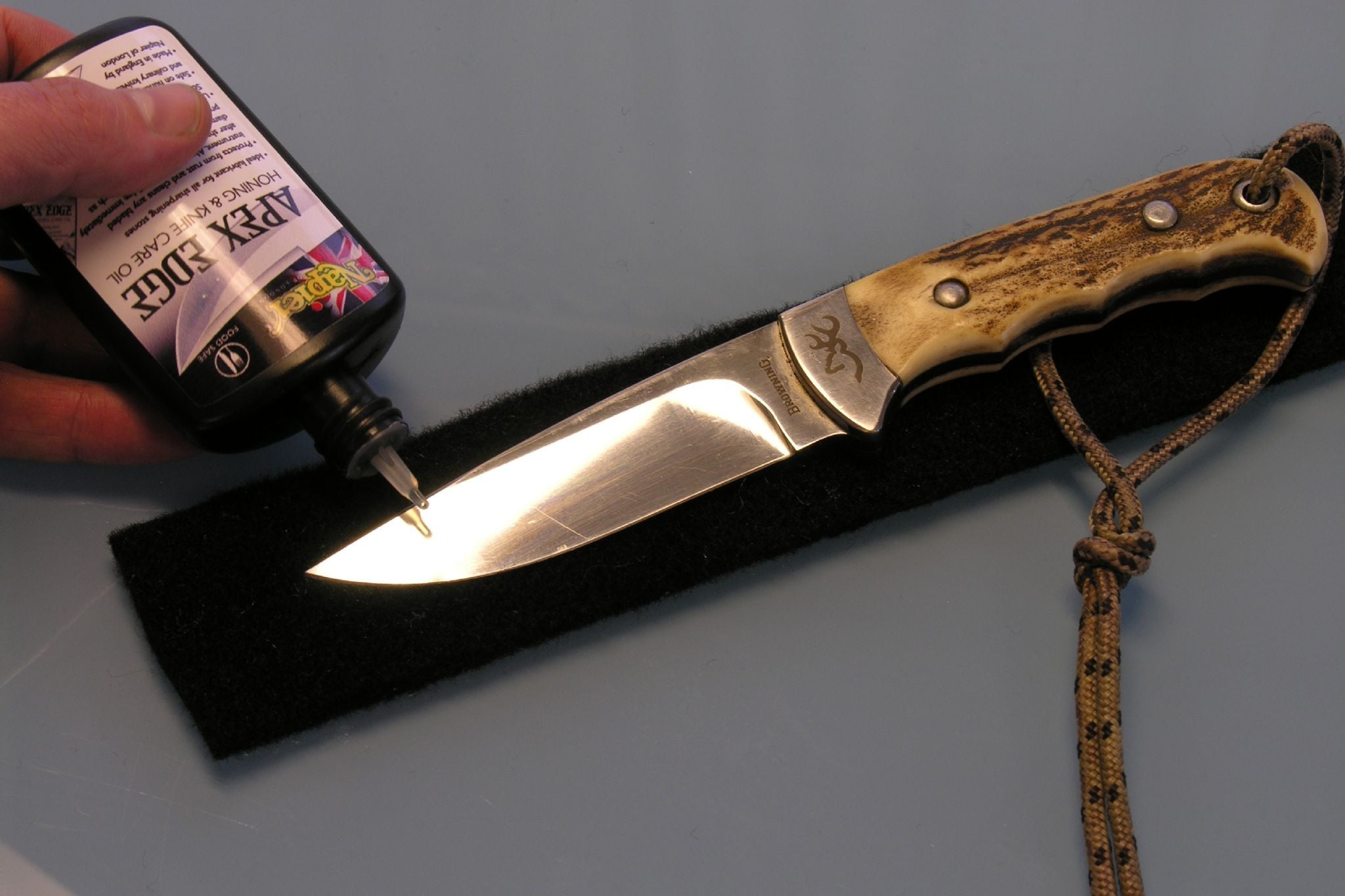 Rothery Napier Honing Oil bottle with label, used for sharpening and honing tools, on a white background.