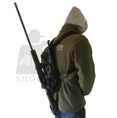 Black Simon backpack with integrated rifle holder, featuring adjustable straps and durable fabric for secure firearm carrying.